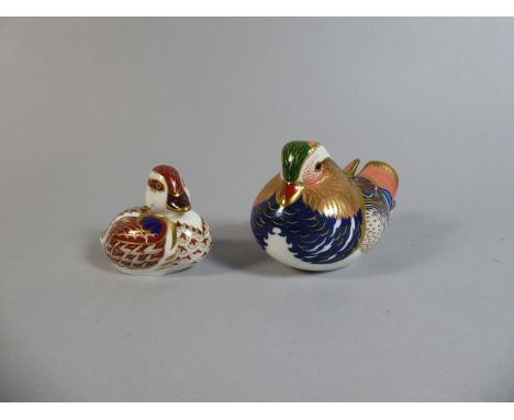 A Royal Crown Derby Paperweight, Mandarin Duck, Gold Button together with Swimming Duckling, Gold Button