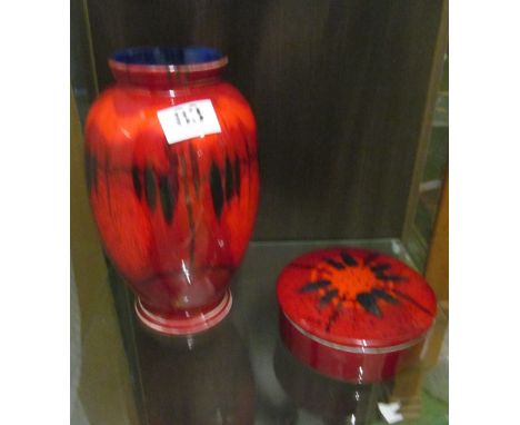 A Poole pottery red and black pattern vase and a similar lidded box