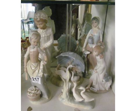 A group of Nao and other figures (one head restored)