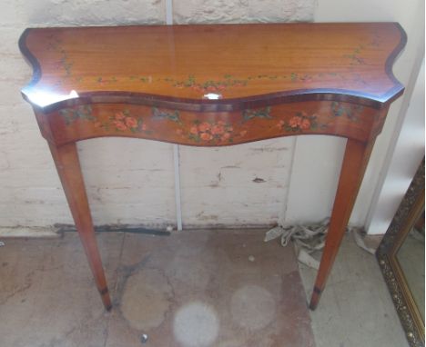 A light mahogany serpentine fronted side table with handpainted floral decoration