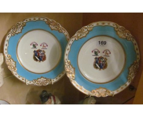 A pair of Graingers Worcester Armorial plates with blue border