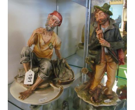 A Capodimonte figure man playing pipe (a/f) and another fisherman with basket of fish (pipe missing)