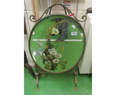A brass firescreen with mirrored front