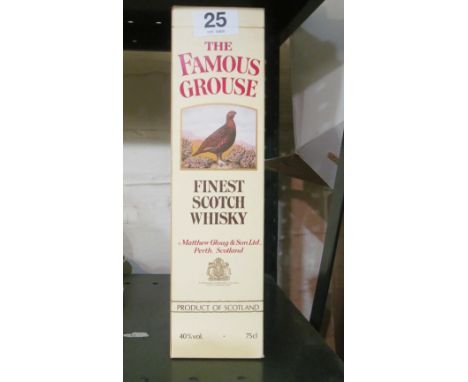 A bottle of Famous Grouse Scotch whisky