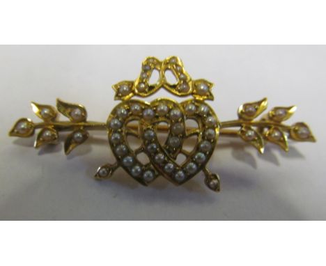 A Victorian seed pearl brooch entwined hearts