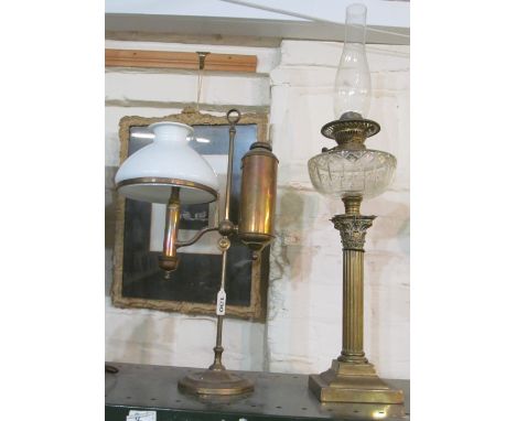 An oil lamp on column support and a student's lamp