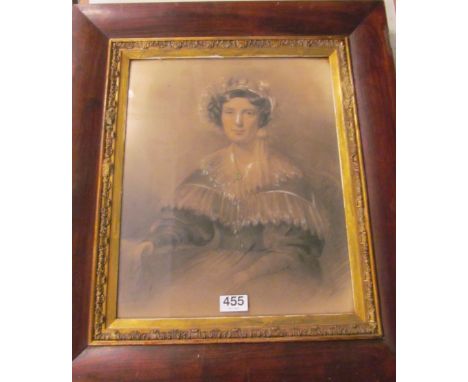 A portrait of lady in rosewood frame