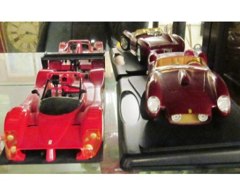 A 250 Testa Rosa and a Ferrari 333SP