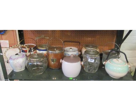 A Poole biscuit barrel and group of others