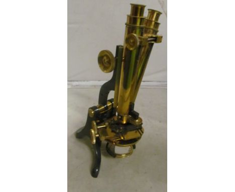 A scientific microscope by Henry Crouch of London in oak case with related instruments et cetera
