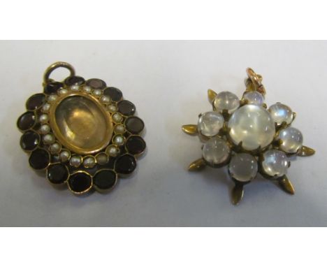 A Victorian seed pearl and garnet hair locket pendant and a moonstone pendant