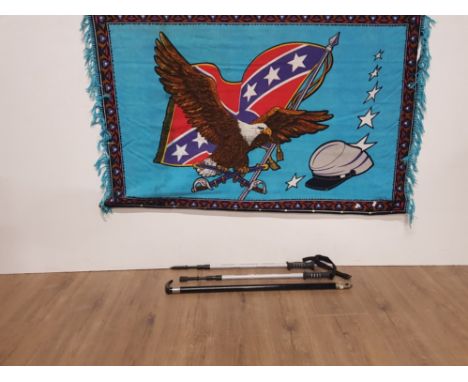 A SILK CONFEDERATE WALL HANGING TOGETHER WITH A PAIR OF TOUR HIKING STICKS AND A WALKING STICK