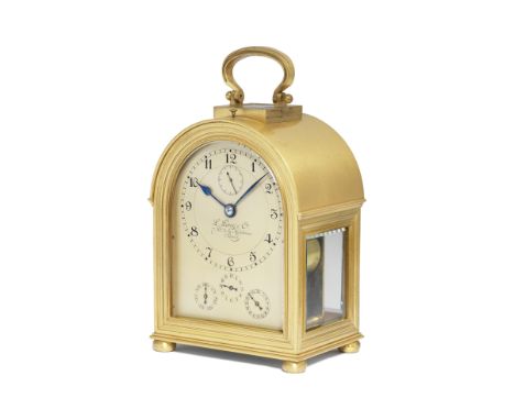 A fine early 20th century French bourne-shaped grande sonnerie carriage clock with running seconds, alarm, day and date. With