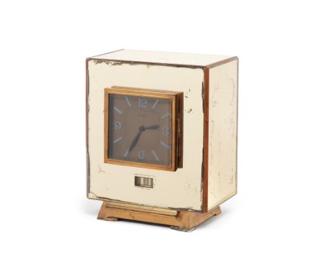 An early 20th century Art Deco peach mirror glass Atmos clockJaeger le Coultre, number 4713The five panel glass case with rec