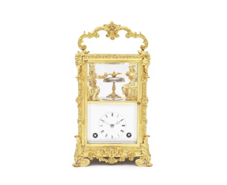 A very rare mid 19th century French automata carriage clock with the original travelLing caseSurmounted by an elaborate cast 