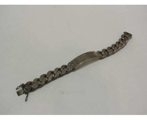 A heavy silver gentleman's identity bracelet