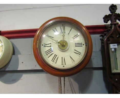 A Post Office clock and pendulum 