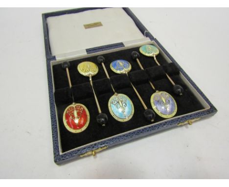 A set of six Turner and Simpson silver gilt and guilloche coffee bean spoons, Birmingham 1973, slight damage present, 55g  