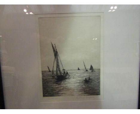 ROWLAND LANGMAID (1897-1956) A signed and framed and glazed etching "Sunlit Sea" depicting sailing boats, 37cm x 49.5cm