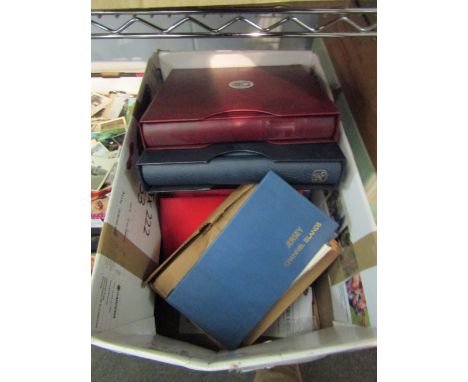 A box of World stamp albums/ first day covers and stamp related material