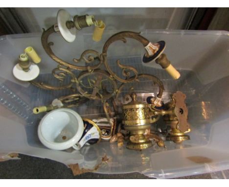An ornate gilt and ceramic electrolier  