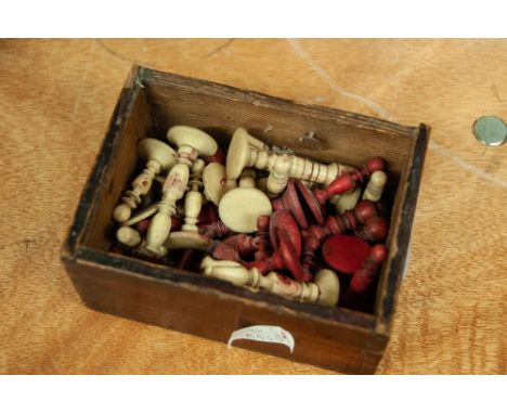NATURAL AND RED STAINED TURNED BONE CHESS SET, height of king, 2 ¾" (7cm) high, red queen a/f, together with FOUR SIMILAR CRI