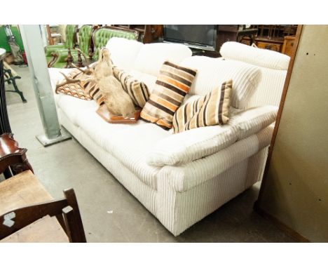 A MODERN DFS THREE SEATER SETTEE IN WHITE PLUSH CORD FABRIC, DITTO TWO SEATER SETTEE, AN ARMCHAIR AND A POUFFE 