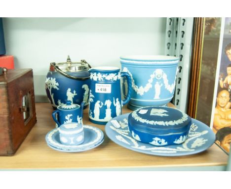 A COLLECTION OF WEDGWOOD BLUE WARES TO INCLUDE; BISCUIT BARREL WITH ELECTROPLATE RIM AND HANDLE, JARDINIERE, TRINKET DISHES, 
