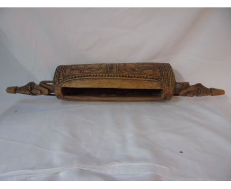 Vintage carved tribal wooden mask and a tribal carving