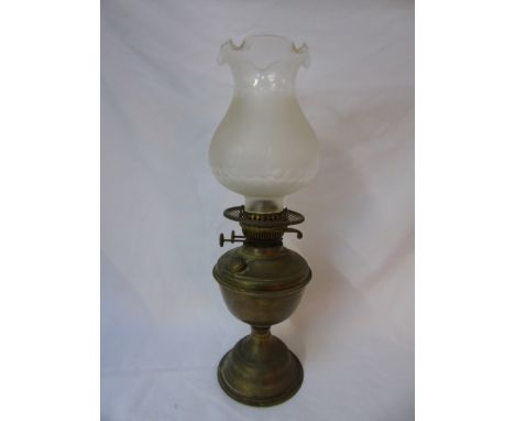 Brass oil lamp with glass shade