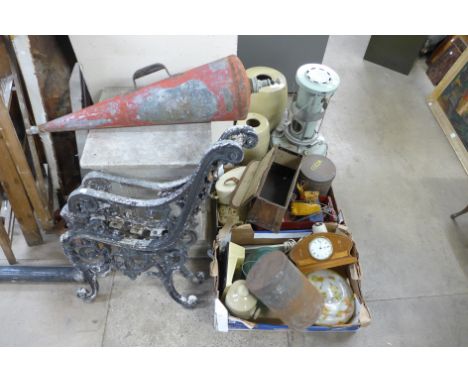 A pair of cast iron bench ends, Aladdin paraffin stove, vintage fire extinguisher, etc.
