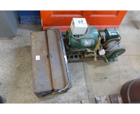 A mobile winch and a box of hand tools