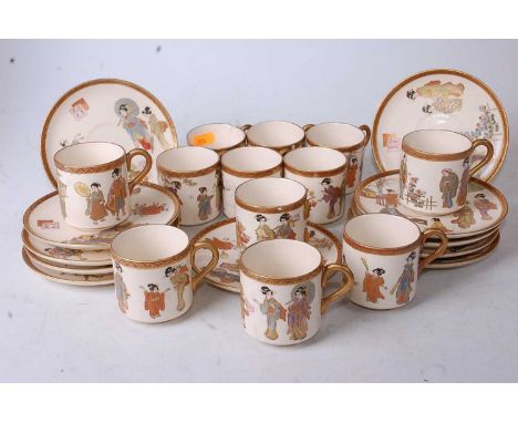 A set of twelve Japanese late Meiji period teacups with elven saucers, each gilt decorated with various figures emblematic of