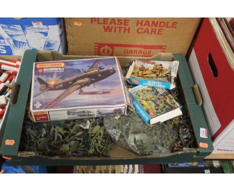 A box of plastic military model soldiers; together with a Matchbox Wellington MK.X 1:72 scale model of a fighter plane etc