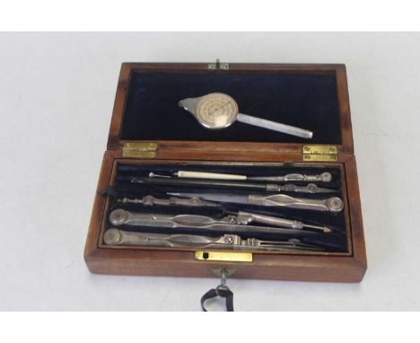 A 19th century draughtsman's set, the mahogany box of plain rectangular form opening to reveal a fitted interior of draughtsm