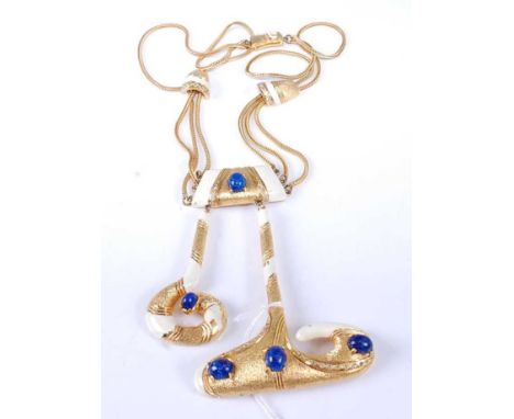 A Pierre Cardin gilt metal, enamel and lapis lazuli set pendant, on triple string neck chain, pendant drop 11cm, in original 