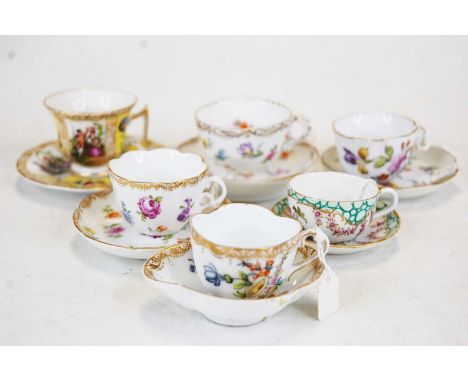 An early 20th century Augustus Rex miniature teacup and saucer, having typical yellow panels with floral decoration, with opp