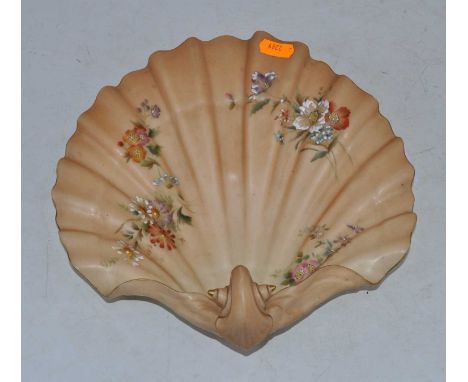 An early 20th century Worcester Royal Chinaworks blush ivory shell shaped dish, having shot enamelled floral decoration, prin