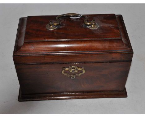 A George III flame mahogany triple compartment tea caddy, the cavetto moulded lid with brass swan-neck handle, the plain rect