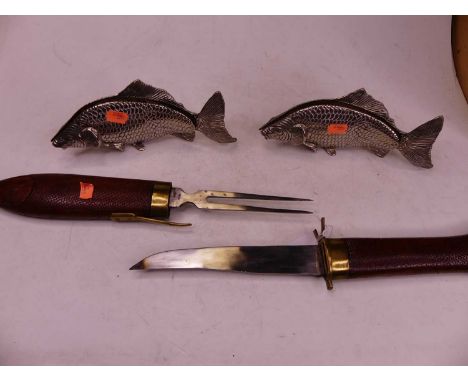 A 20th century Eastern carved knife and fork set, in the form of a fish, length 43cm; together with a pair of plated letter-r
