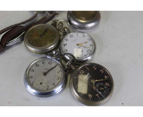 An early 20th century nickel cased open faced pocket watch having an enamel dial with Arabic numerals and subsidiary seconds 