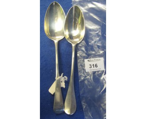 Silver serving spoon, London 1802, together with white metal serving spoon. (2)