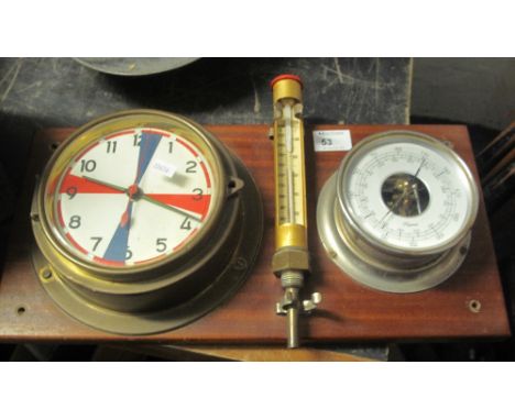 Brass bulk head type clock with coloured sectioned face, bulk head type French Maxant barometer and a brass thermometer all m