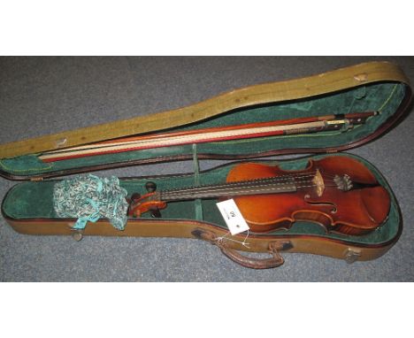 Early 20th Century Stradivarius copy violin, having two piece back with double scribed outline and scrolled tuning head with 