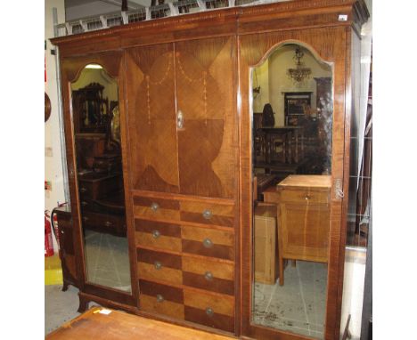 Edwardian Indian silver greywood bedroom suite comprising: large double wardrobe; triple mirror back dressing table; commode 