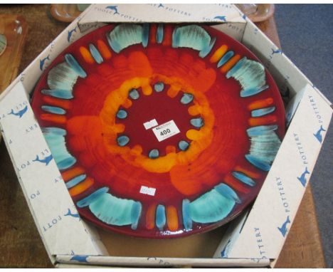 Large Poole Pottery volcano dish or charger in original cardboard box.