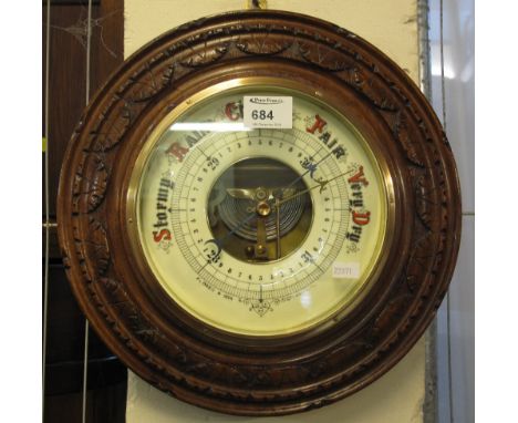 20th Century carved oak aneroid barometer marked: Aldred and Son, Gt Yarmouth.