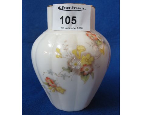 Grainger and Co. Worcester baluster shaped fluted vase, painted with flowers on an ivory ground.  Shape no.: 67 and printed m