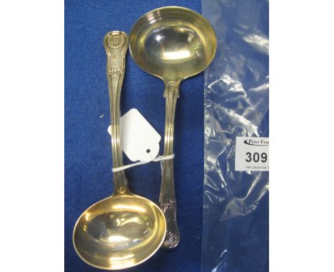 Pair of silver shell design ladles with engraved initial, London hallmarks, maker's initials: T.B. (2) CONDITION REPORT: Dent