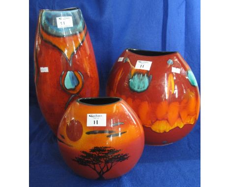 Poole Pottery peacock large Manhattan vase, Poole Pottery large volcano vase and Poole Pottery African sky vase. (3)